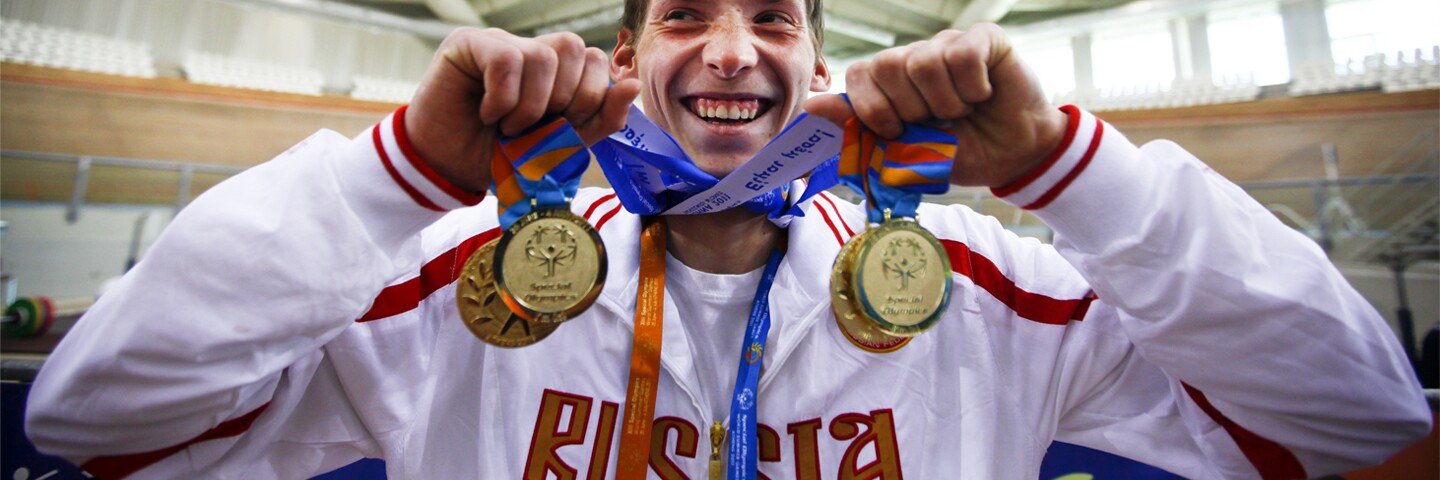 2011 World Games Athens, Greece, a Russian athlete celebrates his medals.