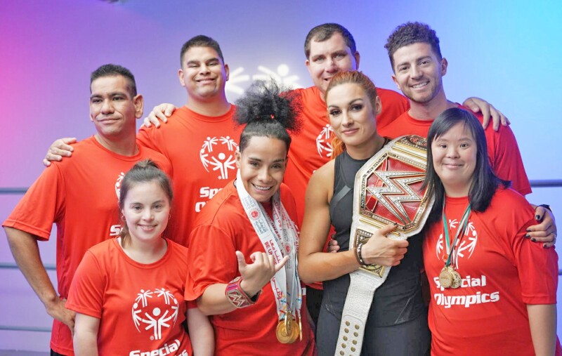 School of Strength Athletes pose with WWE Superstar Becky Lynch 