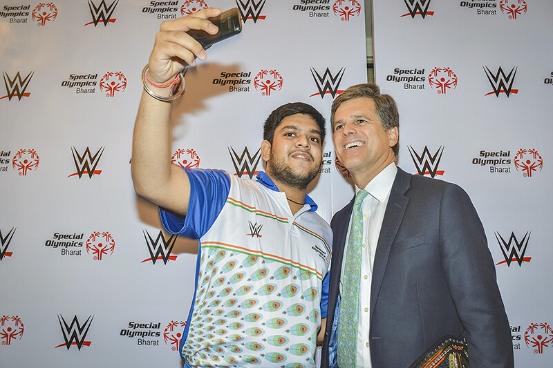 Shrey Kadian poses with Dr. Timothy Shriver, Special Olympics Board Chair
