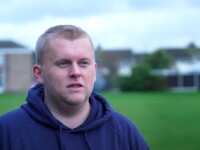 young man on the pitch being interviewed